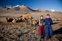 Local herders with their camels. Photo credit: Cam Cope